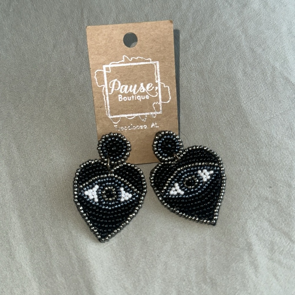 Boutique earrings - beaded eyes - worn once!